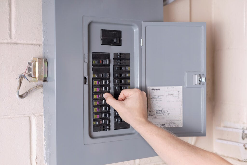 turning on power at the electrical service panel. resetting tripped circuit breaker